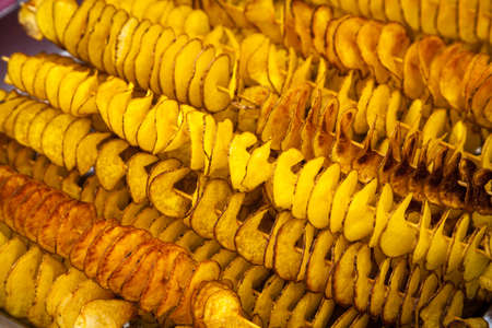 Potatoes sliced spitalyu fried in boiling fat