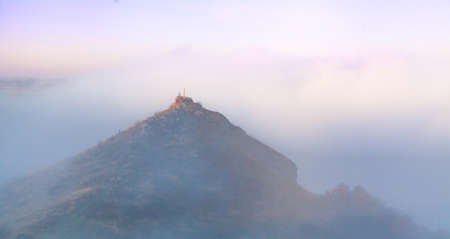 Morning fog among the hills near the Dniester Riverの写真素材