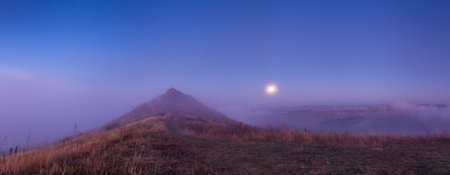 Morning fog among the hills near the Dniester Riverの写真素材
