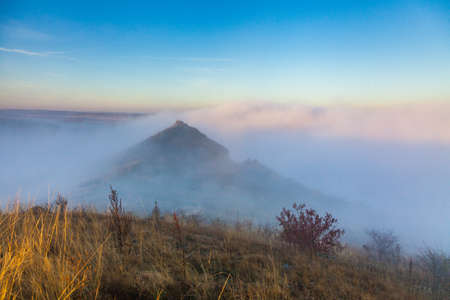 Morning fog among the hills near the Dniester Riverの写真素材