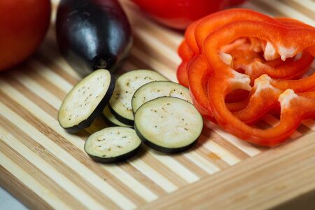Fresh chopped vegetables on a cutting Boardの写真素材