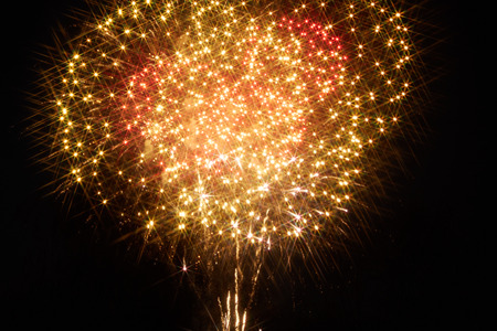 Festive fireworks in the dark skyの写真素材