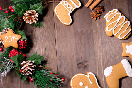 ginger biscuit on brown background with Christmas tree . Close upの写真素材