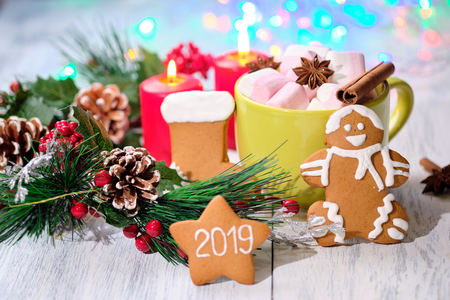 ginger  biscuit on white wooden background with Christmas tree  candles. Selective focusの写真素材