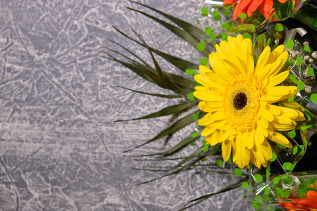 Colorful flowers on grey background.Bouquet of flowers. Copy spaceの写真素材