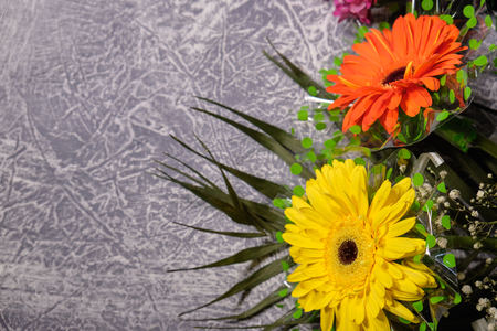 Colorful flowers on grey background.Bouquet of flowers. Copy spaceの写真素材