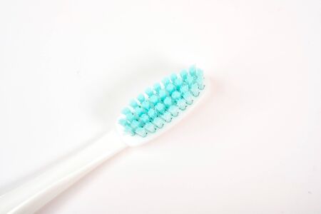 Colorful toothbrushes close-up on a white background. Oral hygiene.の写真素材