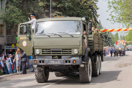 PYATIGORSK, RUSSIA - MAY 9 2014  Victory Day in WWII  Column of driving school of DOSAAF which is...