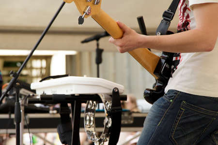 The musician with an electric guitar  Backgroundの写真素材