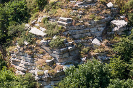 Naked layers of the crust on the way to the top of Lisaya Mountain, Russiaの写真素材