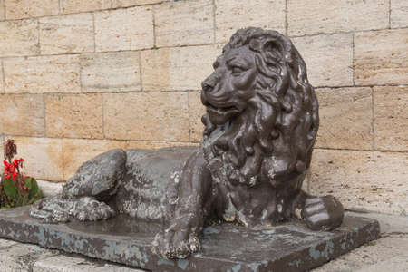 PYATIGORSK, RUSSIA - AUGUST 11, 2014  Sculpture of lion before an entrance to a tunnel to the underground lake Provalのeditorial素材