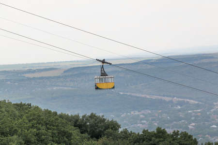 PYATIGORSK, RUSSIA - AUGUST 11, 2014  Empty gondola of passengers cable-way in Mountain Mashukのeditorial素材