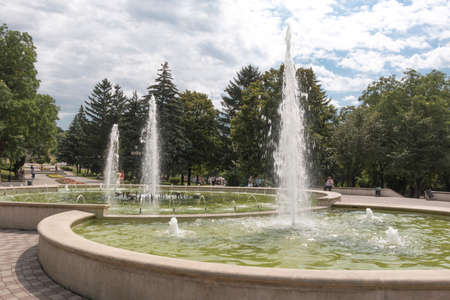 PYATIGORSK, RUSSIA - AUGUST 11, 2014: The fountain on Lenin Square in the bright sunny dayの写真素材