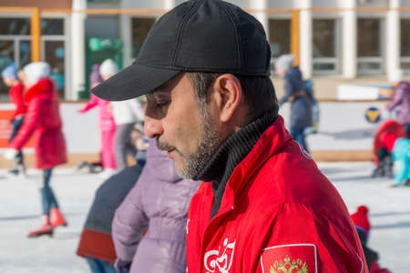 PYATIGORSK, RUSSIA - JANUARY 4, 2015: Trainer at the open-air ice rinkのeditorial素材