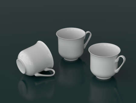Realistic three white porcelain teacups on a dark backgroundの写真素材