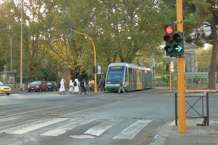 Rome, Italy - August 17, 2015: Nuns entering in the tram at the Piazza Di Porta Maggiore  in the early morningのeditorial素材