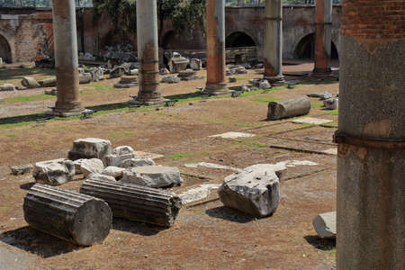 Rome, Italy - August 17, 2015: Fragments of broken ancient columns on a place of the roman forumのeditorial素材