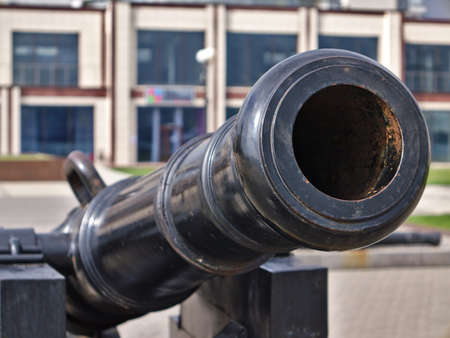 Muzzle ancient cannon close-up. Free open air museum of ancient cannons and anchors. Novorossiysk, Russiaのeditorial素材