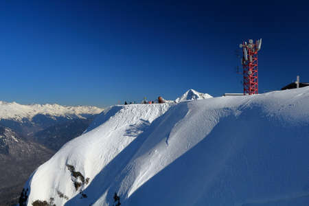 Tower of cellular communication in the mountains. Ski resort Rosa Khutor. Sochi, Krasnaya Polyana, Krasnodar Territory, Russiaの写真素材