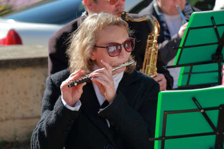 Pyatigorsk, Russia - November 4, 2017: Musician with flute. Free concert in the public park Tsvetnik. Celebrating the National Unity Day in Russiaのeditorial素材