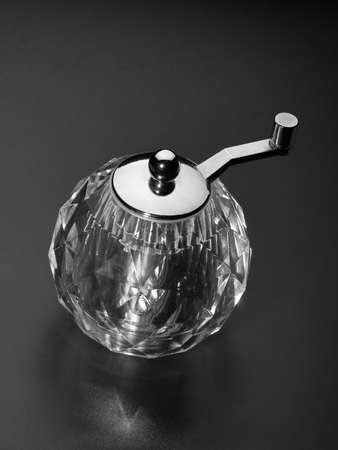 Empty round crystal pepper mill on a black background. Kitchenwareの写真素材