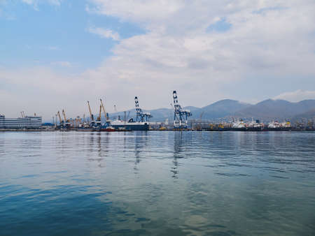 Novorossiysk, Russia - August 15, 2017: View of the Tsemes Bay in Novorossiysk with container handling gantry cranes in dock for loading and unloading intermodal containers from container shipsのeditorial素材