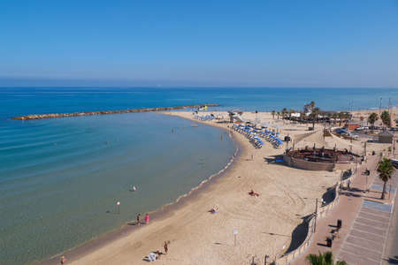 Netanya, Israel - June 6, 2017: Top view of the beach with tourists in Mediterranean Seaのeditorial素材