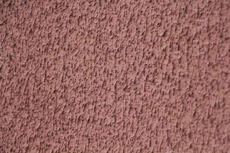 Rough concrete wall with thorns. Abstract backgroundの写真素材