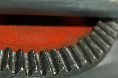 Gear of an old hand drill close-up. Abstract industrial backgroundの写真素材