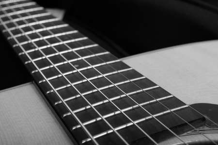 Classic acoustic guitar close-up. Monochrome imageの写真素材