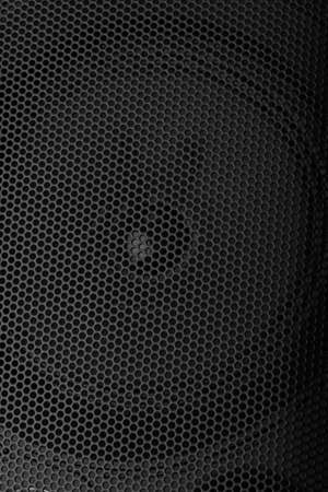 Black speaker grill texture close-up. Abstract backgroundの写真素材
