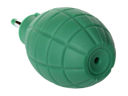 Green rubber pear to clean the optics from dust in the form of a hand grenade. Isolated on white backgroundの写真素材