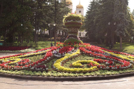 Pyatigorsk, Russia - August 13, 2018: Flower bed in the form of a vase near the Cathedral of Christ the Savior (Spassky Cathedral) at sunriseのeditorial素材
