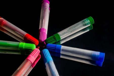 Colored marker pens on wood backgroundの写真素材