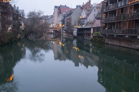 Old Nuremberg fortress Berlin. Germany, January 2020. The Nuremberg River Channel. Landscape of evening old houses on the waterのeditorial素材