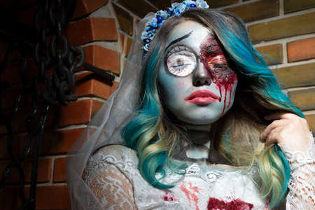 Halloween concept of bride in white dress and bloody makeup, mystical devil bride Battered woman...