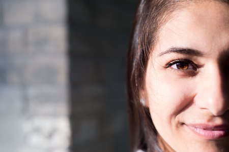 Portrait of a beautiful young multiethnic, smiling. Close-upの写真素材