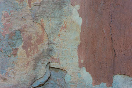 texture of brown old plaster on the street wall of the house. Warm shades Old Wall Texture