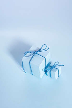 top view, christmas flatley of gifts, new year decorations, on a blue background blue christmas cardの写真素材