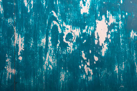 texture of wooden old vintage blue-white table background. Shabby wood background