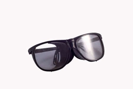 black safety glasses for work, isolate on white background Safety glasses, isolated on white...