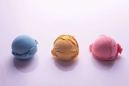 set of colored balls of ice cream on a white background.の写真素材