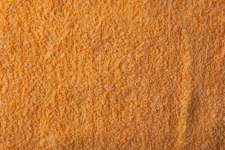 texture of orange towel close-up, top view.の写真素材