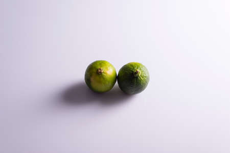 lime on a black and white background. Minimalist.の写真素材