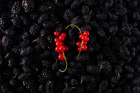 Red berries pattern isolated on a white background. Strawberries, blueberries, raspberries, red...