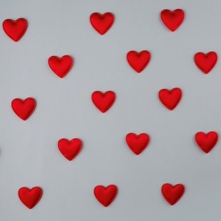 pattern red hearts on a gray background.の写真素材