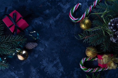 christmas flat lay with new year decorations on an abstract background with gifts and lollipops.の写真素材