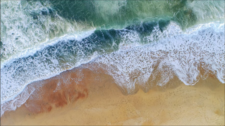beautiful sandy beach and soft blue ocean waveの素材
