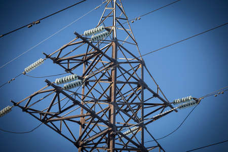 power lines on blue sky backgroundの写真素材