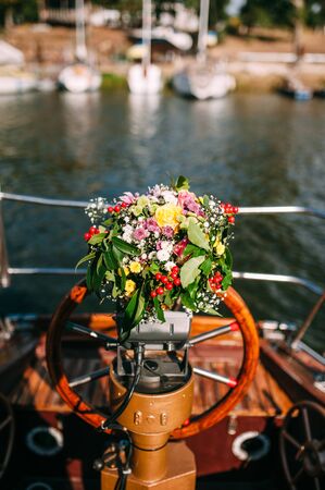 wedding bouquet lies at the helmの写真素材